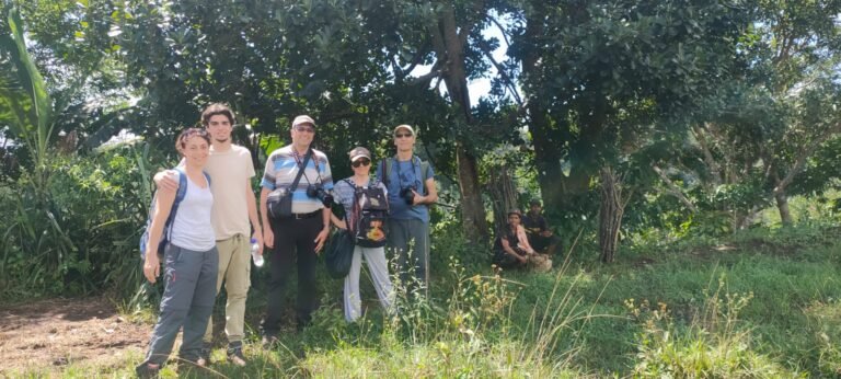 The group paused after walking through the rice terrace at Lingko Ratung